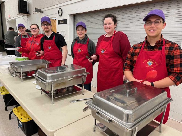 Young Adult Ministry members served the opening fish fry dinner Feb. 16.